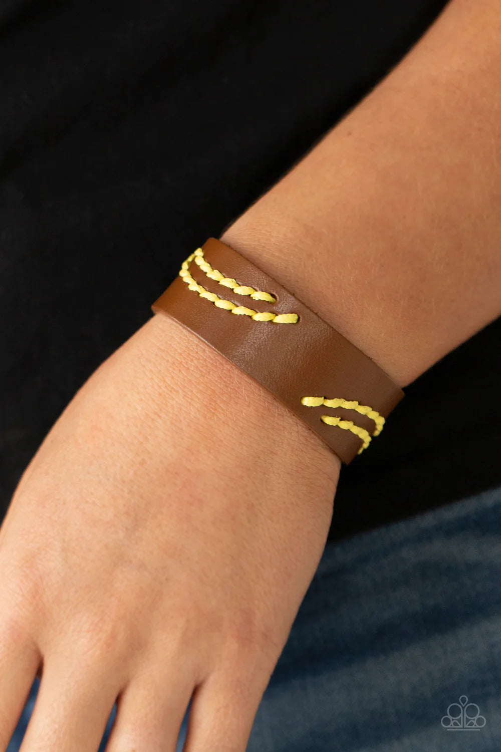 Paparazzi Accessories Harmonic Horizons - Yellow Illuminating cording is stitched across the front of a brown leather band, creating curved patterns. Features an adjustable snap closure. Sold as one individual bracelet. Jewelry