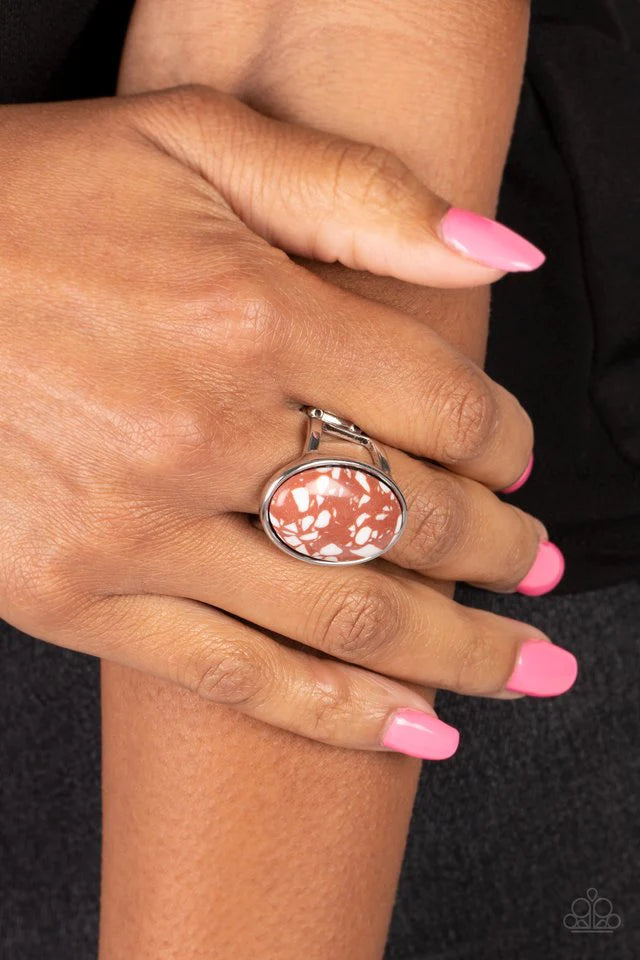 Paparazzi Accessories Majestic Marbling - Brown Featuring a colorful marble finish, a speckled brown stone is pressed into the center of a silver oval frame for a modern look. Features a stretchy band for a flexible fit. Sold as one individual ring. Jewel