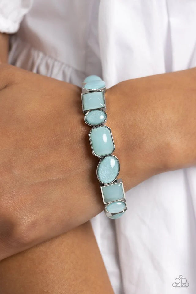Paparazzi Accessories Giving Geometrics - Blue Encased in sleek silver geometric fittings, a glossy collection of Skylight beads alternate with glittery Skylight beads along stretchy bands around the wrist for a dainty pop of color. Jewelry