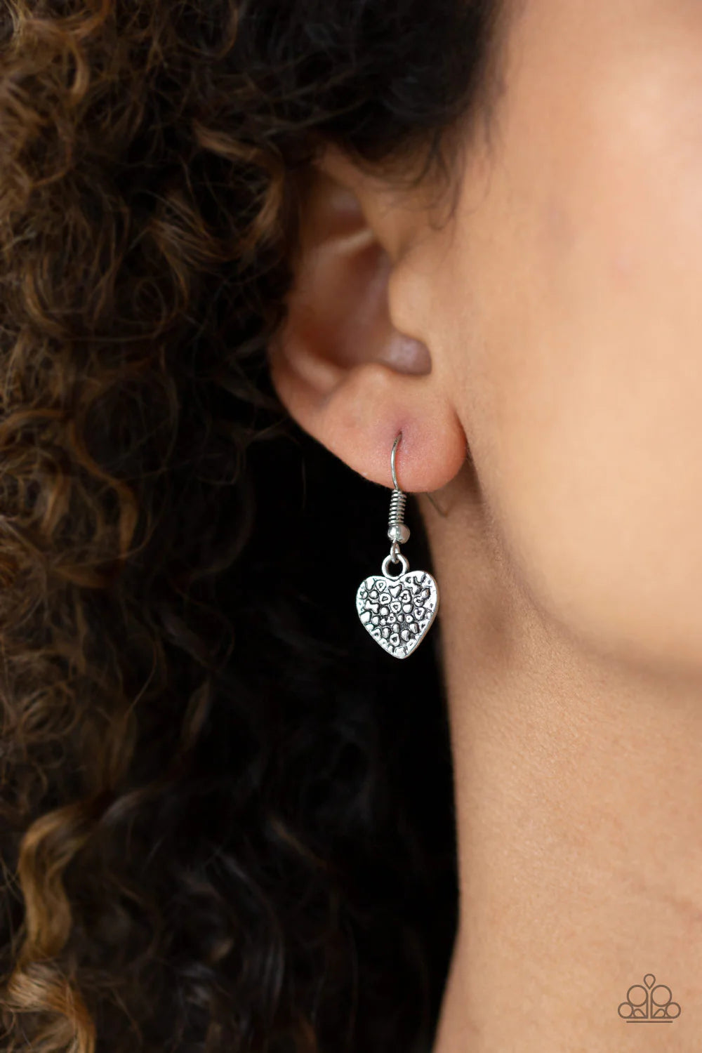 Paparazzi Accessories Grow Love - Green Featuring an array of floral patterns, a collection of silver hearts swings from the bottom of a shimmery silver chain. Alternating charms are brushed in a minty green finish, creating a colorful fringe below the co