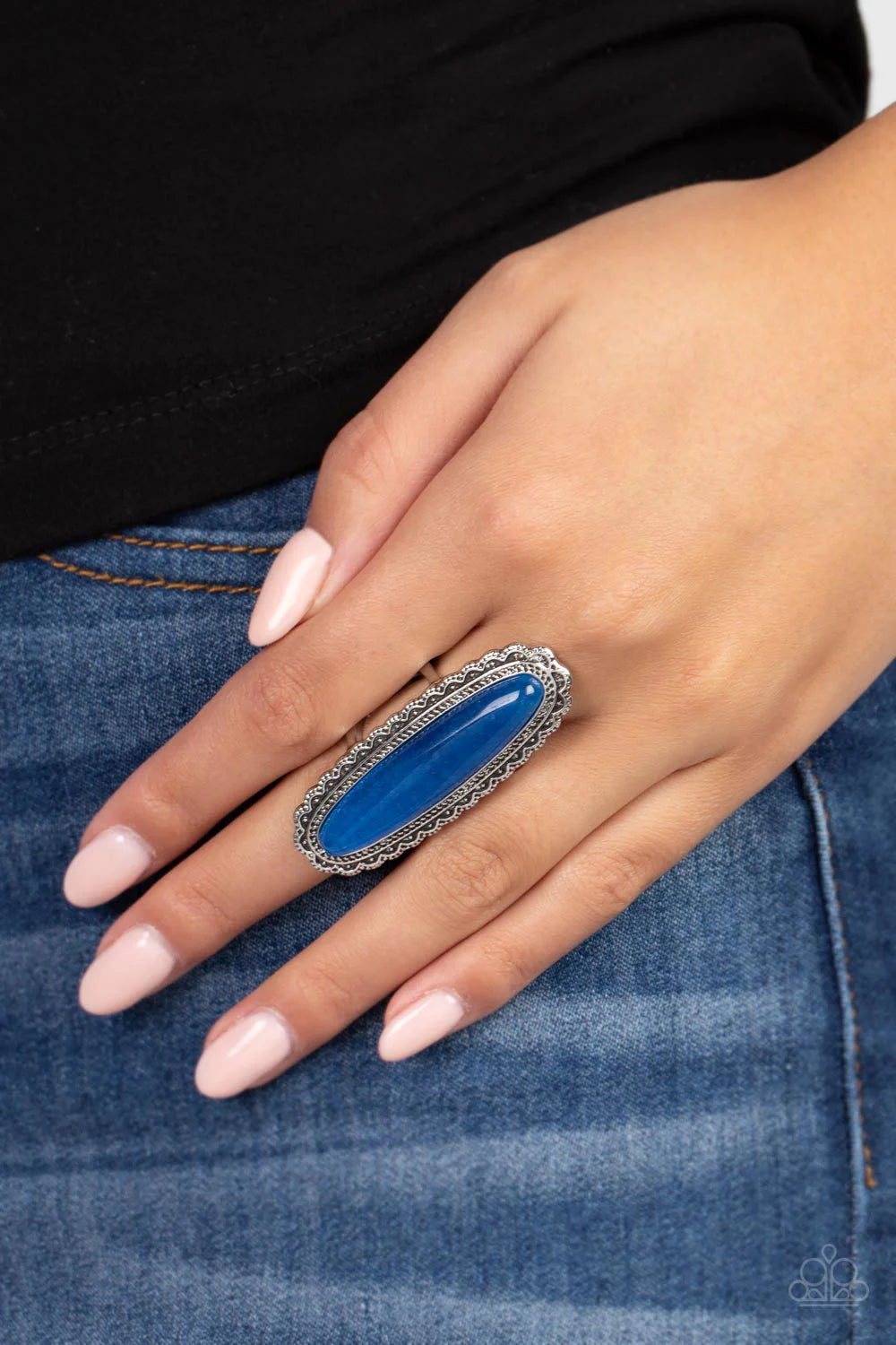 Paparazzi Accessories Eco Equinox - Blue An elongated oval lapis stone embellishes the center of a decorative studded silver frame, creating an exaggerated earthy centerpiece. Features a stretchy band for a flexible fit. Sold as one individual ring. Jewel