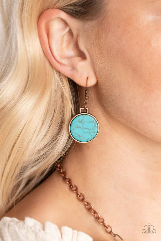 Paparazzi Accessories Santa Fe Flats - Copper Flat turquoise stones are pressed into antiqued copper frames, creating a bold, rustic statement piece. The irregular shape of the stones brings an artisanal touch to the design, as the hinge-like links connec