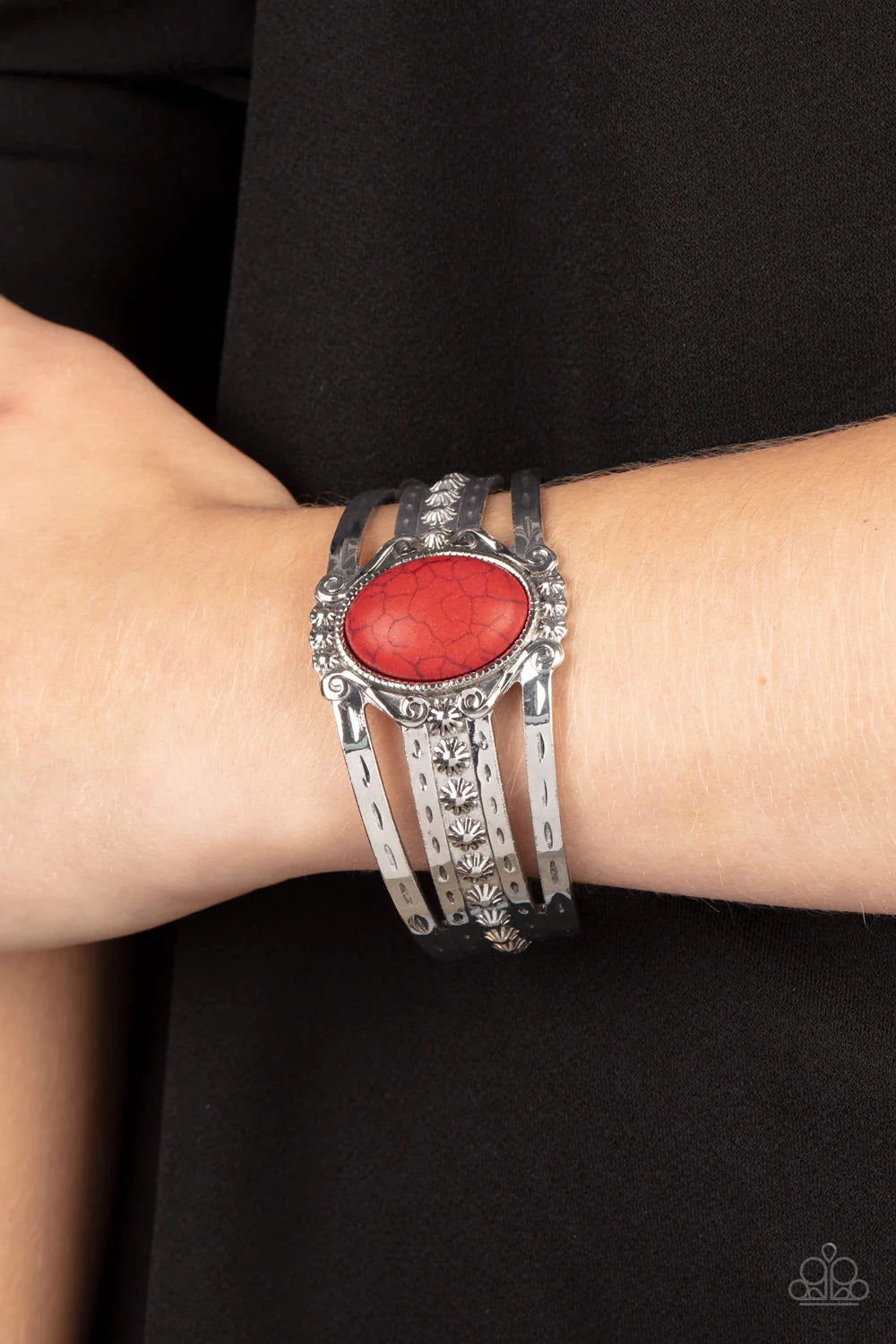 Paparazzi Accessories Mojave Mecca - Red An oversized oval red stone is pressed into the center of an ornately studded silver frame atop a layered silver cuff featuring matching studded textures. Sold as one individual bracelet. Jewelry