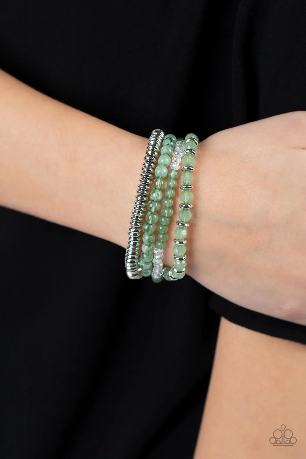 Paparazzi Accessories Destination Dreamscape - Green A mismatched collection of opaque and crystal-like Basil beads intermix with silver accents and white crystal-like beads along stretchy bands around the wrist, creating colorful layers. Sold as one set