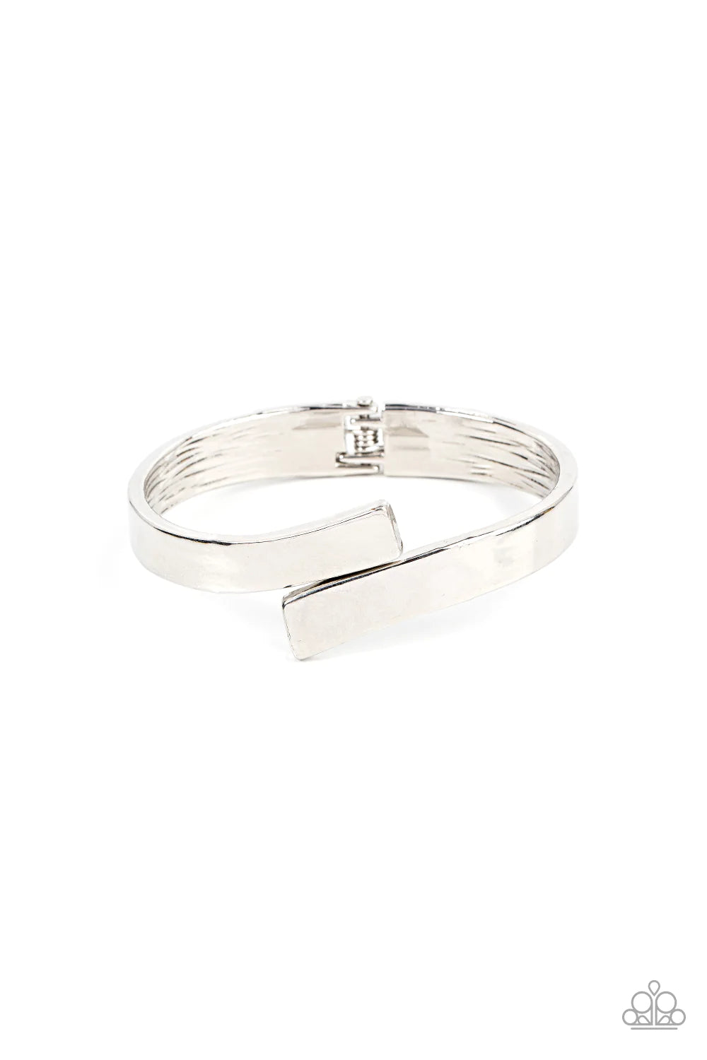 Paparazzi Accessories Dare to Flare - Silver Two oversized silver ribbons delicately overlap across the center of the wrist, creating a stylish and stackable bangle-like cuff. Features a hinged closure. Sold as one individual bracelet.