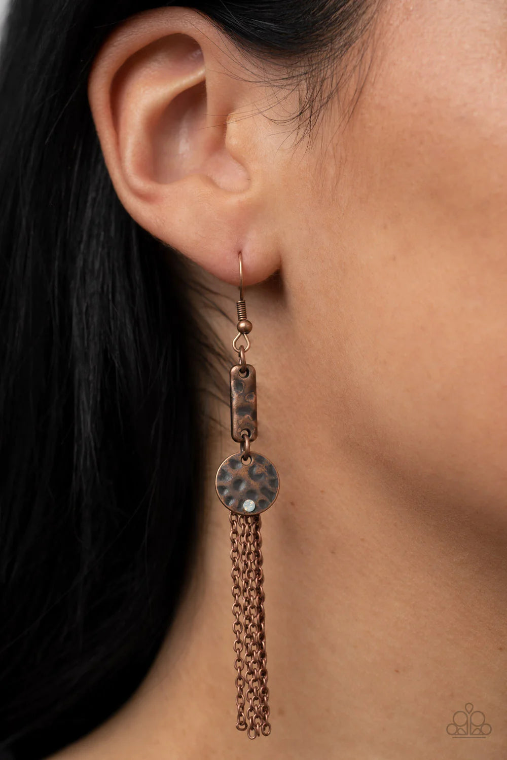 Paparazzi Accessories Twinkle Twinkle Little Trinket - Copper Dainty copper chains stream from a hammered copper bar. A small hammered copper disc, dotted with a single dainty opal rhinestone, sways in front for a charismatic finish. Earring attaches to a