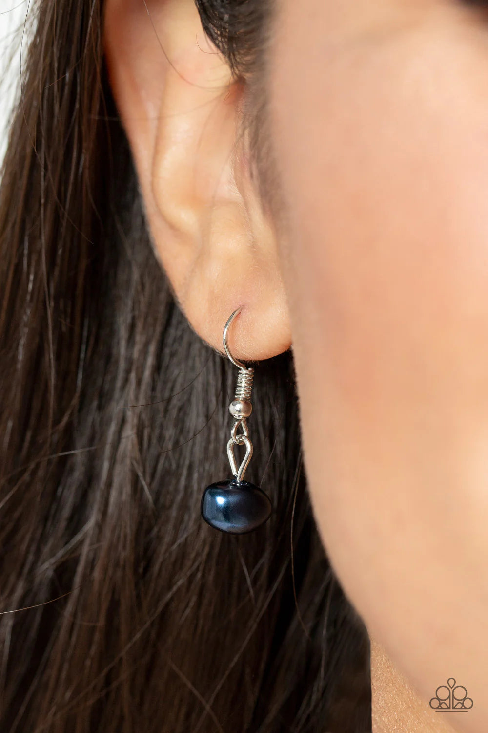 Paparazzi Accessories Shoreline Shimmer - Blue Enchanting sections of asymmetrical blue pearls and glassy blue teardrop beads alternate along an elegantly extended silver chain, creating a refined pop of color across the chest. Features an adjustable clas