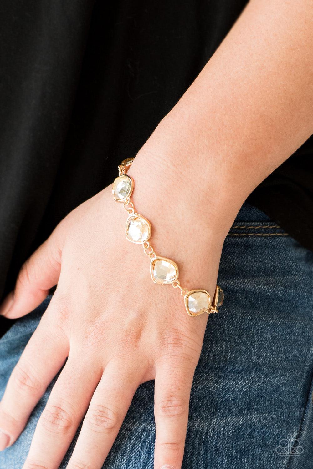 Paparazzi Accessories Perfect Imperfection - Gold Featuring shimmery gold frames, imperfect golden gems link around the wrist for a glamorous vintage inspired look. Features an adjustable clasp closure. Sold as one individual bracelet. Jewelry