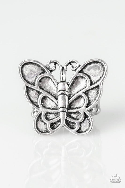 Paparazzi Accessories Sky High Butterfly - Silver Brushed in an antiqued finish, a dramatic silver butterfly blooms across the finger for a whimsical look. Features a stretchy band for a flexible fit. Sold as one individual ring. Jewelry