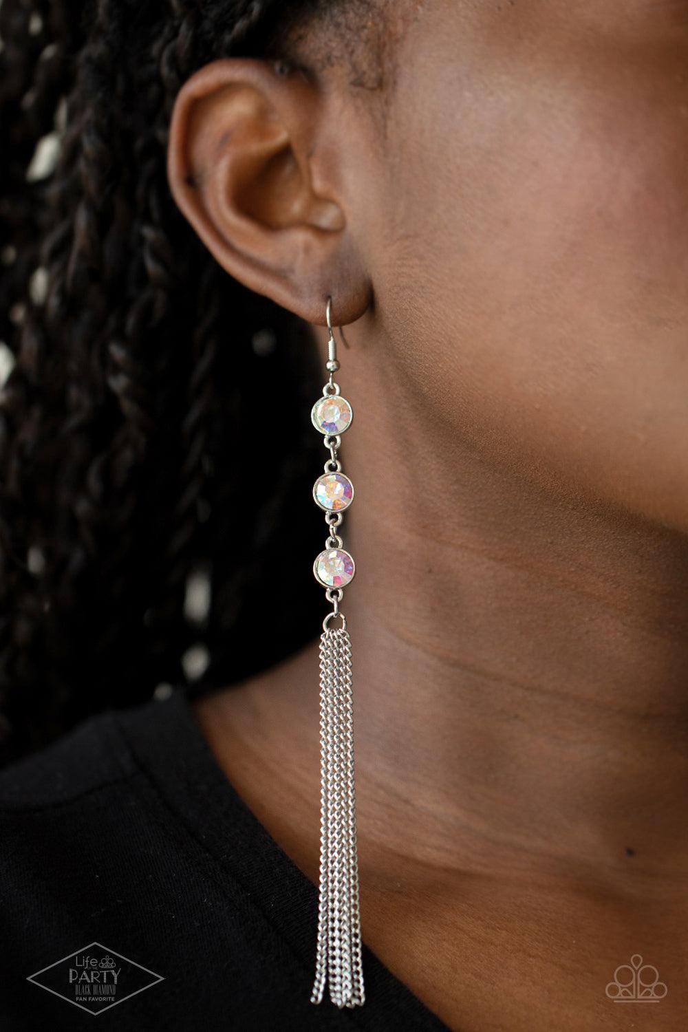 Paparazzi Accessories Moved to TIERS - Multi A shimmery silver chain tassel swings from the bottom of a stack of three iridescent rhinestones, creating a fabulously tiered look. Earring attaches to a standard fishhook fitting. Sold as one pair of earrings