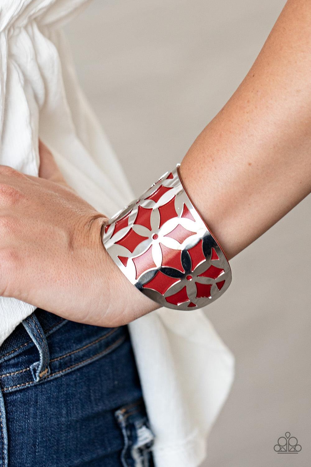 Paparazzi Accessories Garden Fiesta - Red A thick piece of Samba leather peeks out through a daisy stenciled silver cuff, creating a colorful centerpiece around the wrist. Sold as one individual bracelet. Bracelets