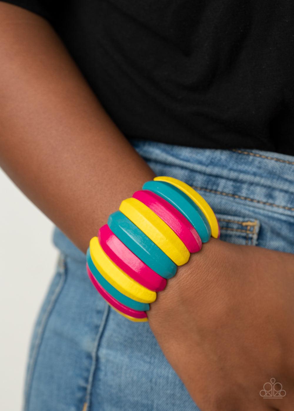 Paparazzi Accessories Colorfully Congo - Multi Painted in blue, yellow, and Pink Peacock finishes, beveled wooden frames are threaded along stretchy bands around the wrist for a summery look Sold as one individual bracelet. Bracelets
