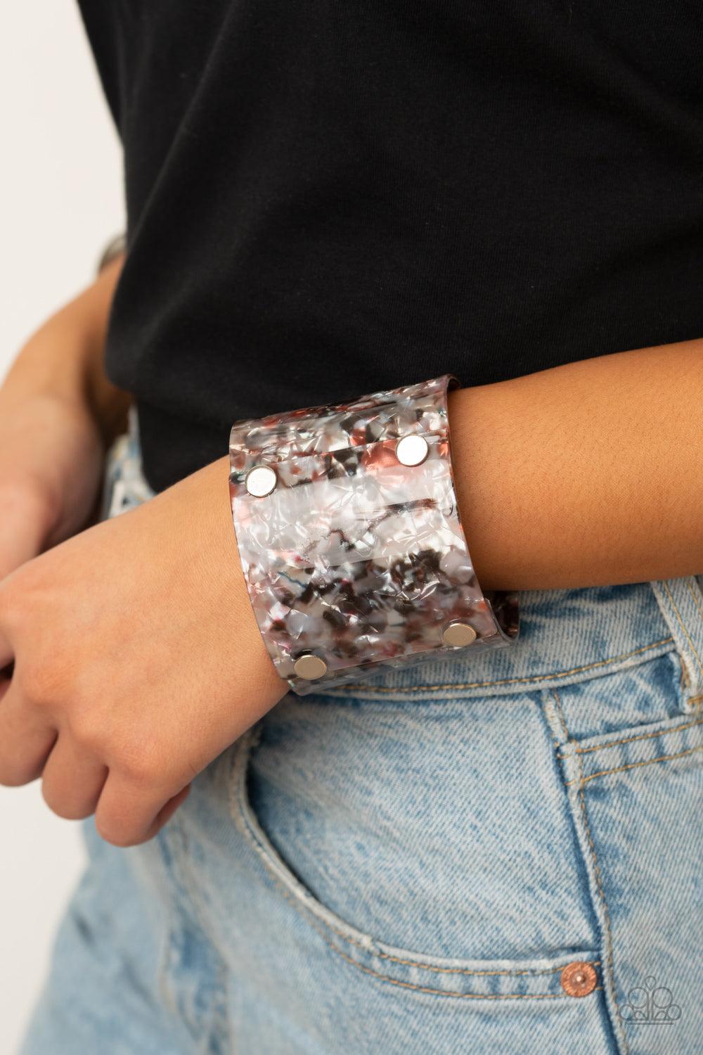 Paparazzi Accessories What are you waiting FAUX? - Multi Featuring a shell-like finish, pieces of iridescent acrylic frames are bolted in place into a stylish cuff around the wrist. Sold as one individual bracelet. Jewelry