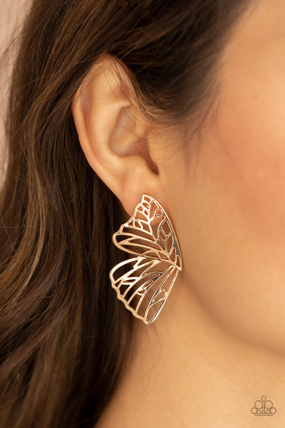 Paparazzi Accessories Butterfly Frills - Gold Shimmery gold bars delicately climb scalloped gold frames, coalescing into a whimsical butterfly wing. Earring attaches to a standard post fitting. Sold as one pair of double-sided post earrings. Earrings