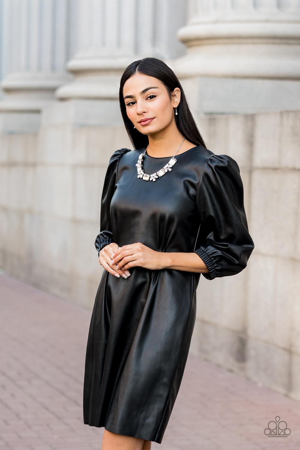 Paparazzi Accessories Long Live Sparkle - White An oversized collection of white emerald cut gems and regally cut clusters of rhinestones delicately link below the collar, creating a dramatically sparkly fringe. Features an adjustable clasp closure. Sold