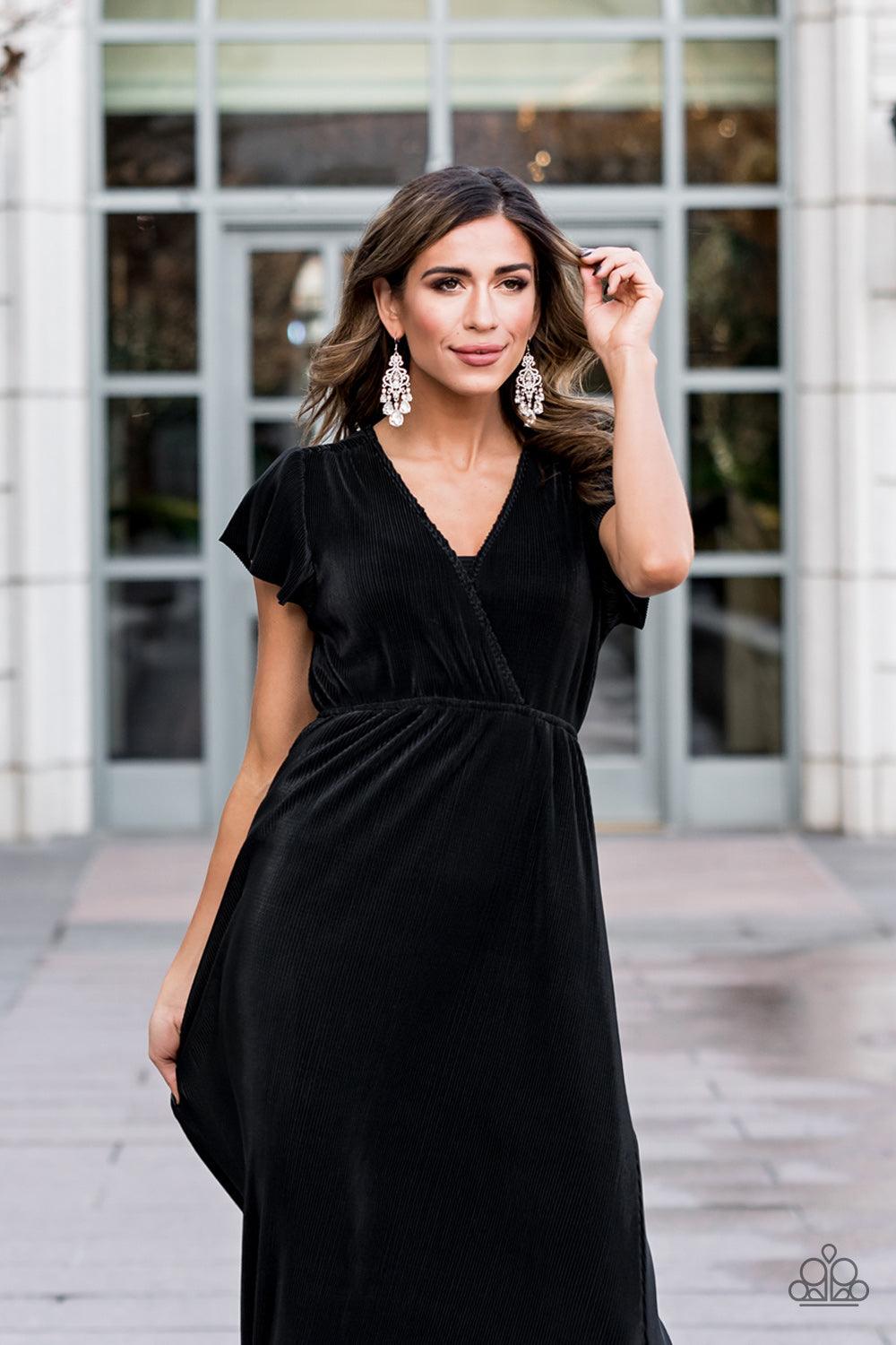 Paparazzi Accessories Queen Of All Things Sparkly - White Gradually increasing in size, glassy white teardrop gems create a dramatic fringe at the bottom of a decorative silver frame swirling with dainty white rhinestones for a timelessly over-the-top spa