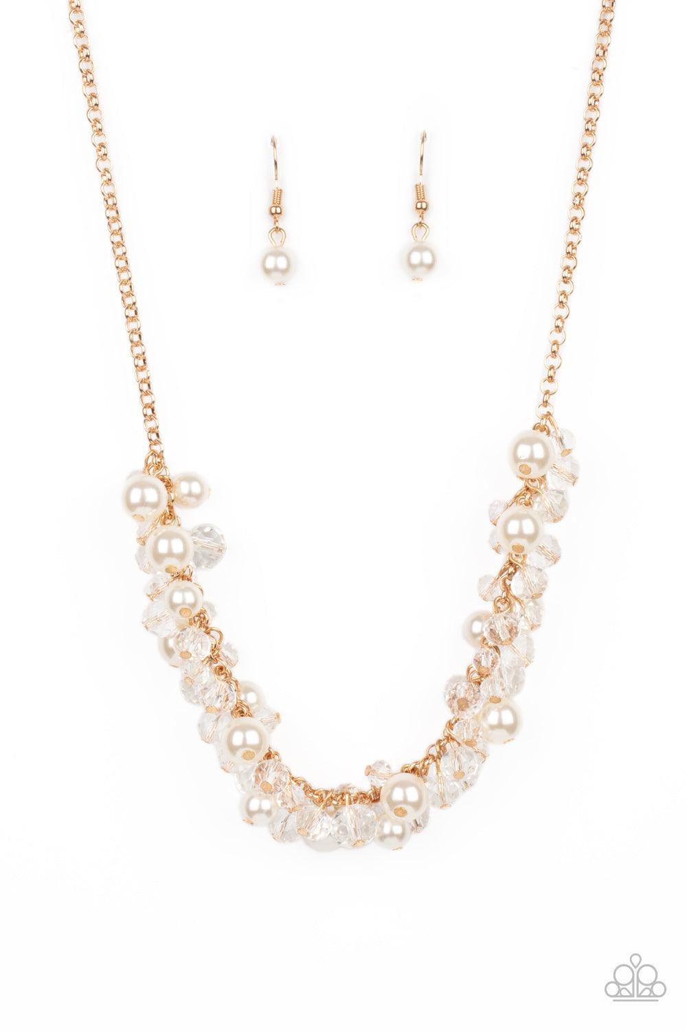 Paparazzi Accessories Pardon My FRINGE - Gold A royal collection of classic white pearls and glassy crystal-like beads swing from the bottom of a dainty gold chain, creating a glamorously clustered fringe below the collar. Features an adjustable clasp clo