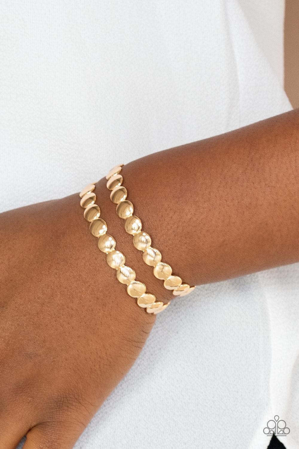 Paparazzi Accessories On The Spot Shimmer - Gold Brushed in a shiny finish, rows of flattened gold studs coalesce into a shimmery cuff around the wrist. Sold as one individual bracelet. Jewelry