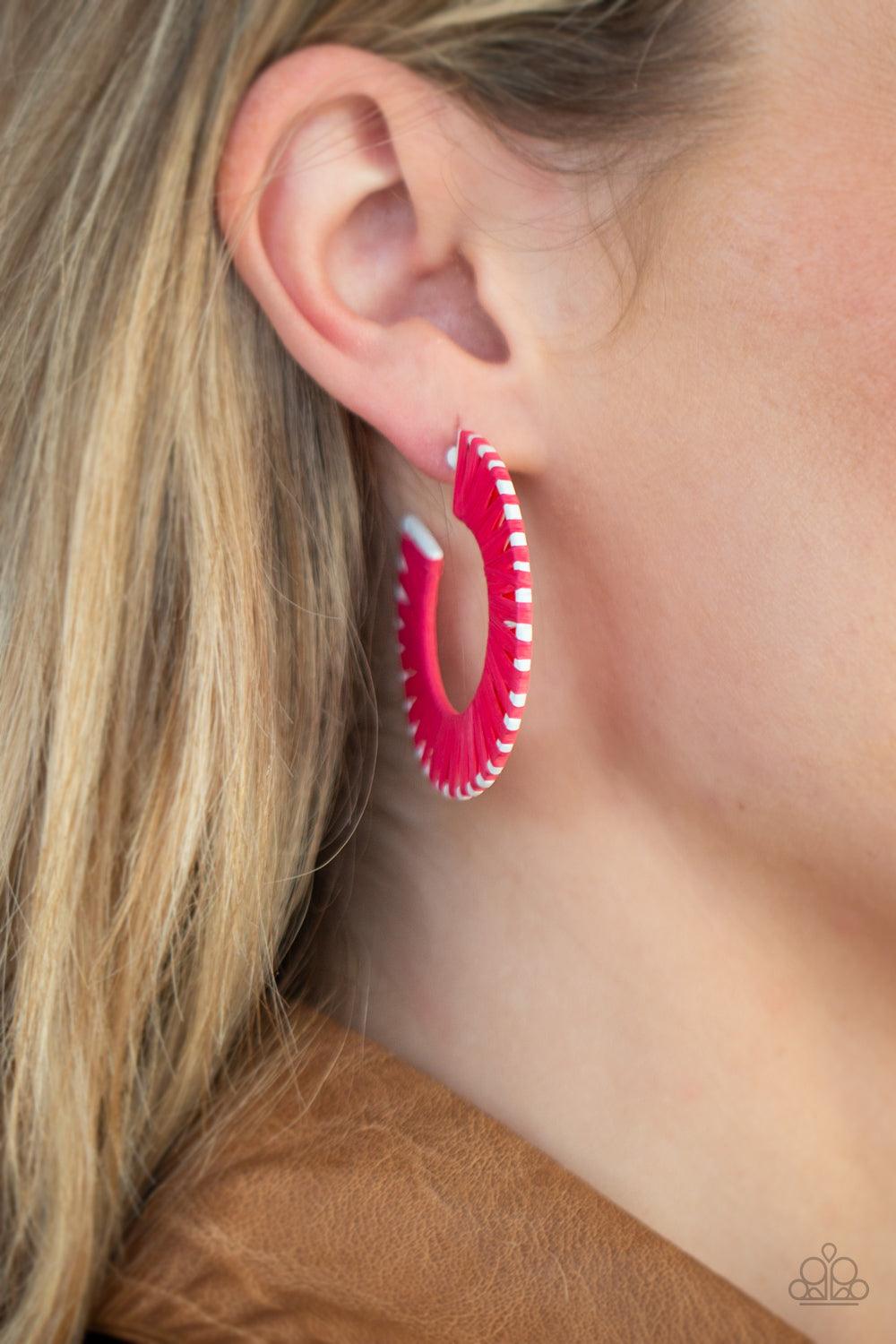 Paparazzi Accessories Everybody Conga! - Pink Pink wicker-like cording is wrapped around a white hoop, creating a vivacious pop of color. Earring attaches to a standard post fitting. Hoop measures approximately 1 3/4" in diameter. Sold as one pair of hoop