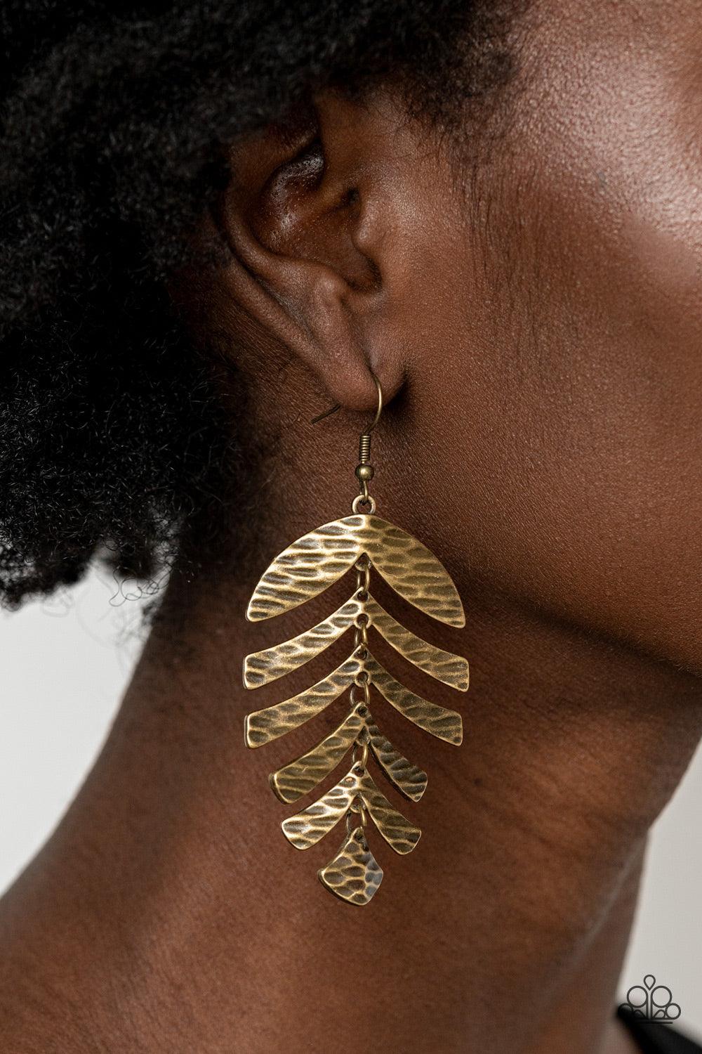Paparazzi Accessories Palm Lagoon - Brass Rippling with tactile textures, dainty antiqued brass frames link into a dancing palm leaf for a simply seasonal fashion. Earring attaches to a standard fishhook fitting. Sold as one pair of earrings. Jewelry