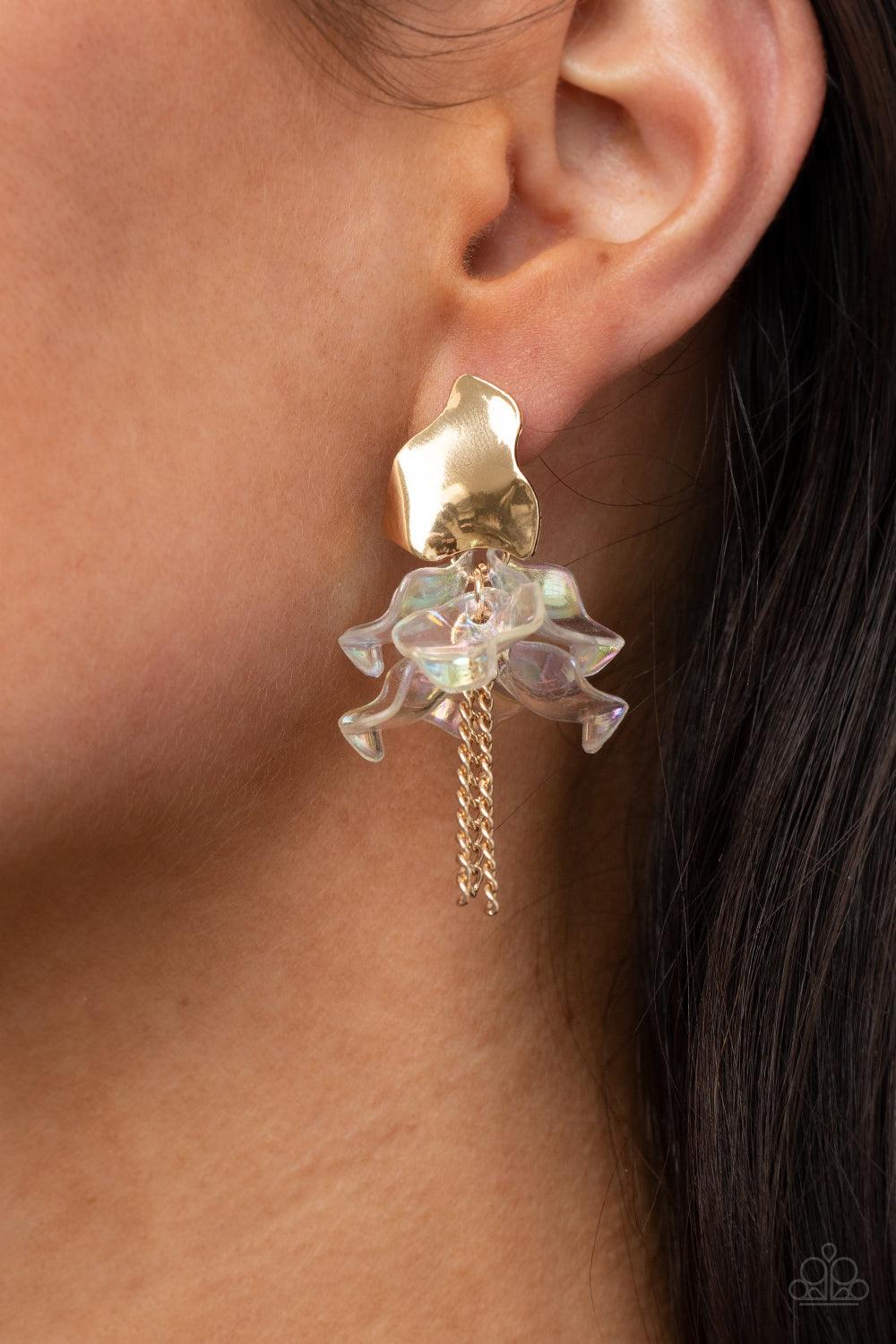 Paparazzi Accessories Harmonically Holographic - Gold Dainty gold chains stream out from the bottom of iridescent acrylic petal-like frames that attach to an asymmetrical gold frame, creating an enchanting cluster. Earring attaches to a standard post fitt