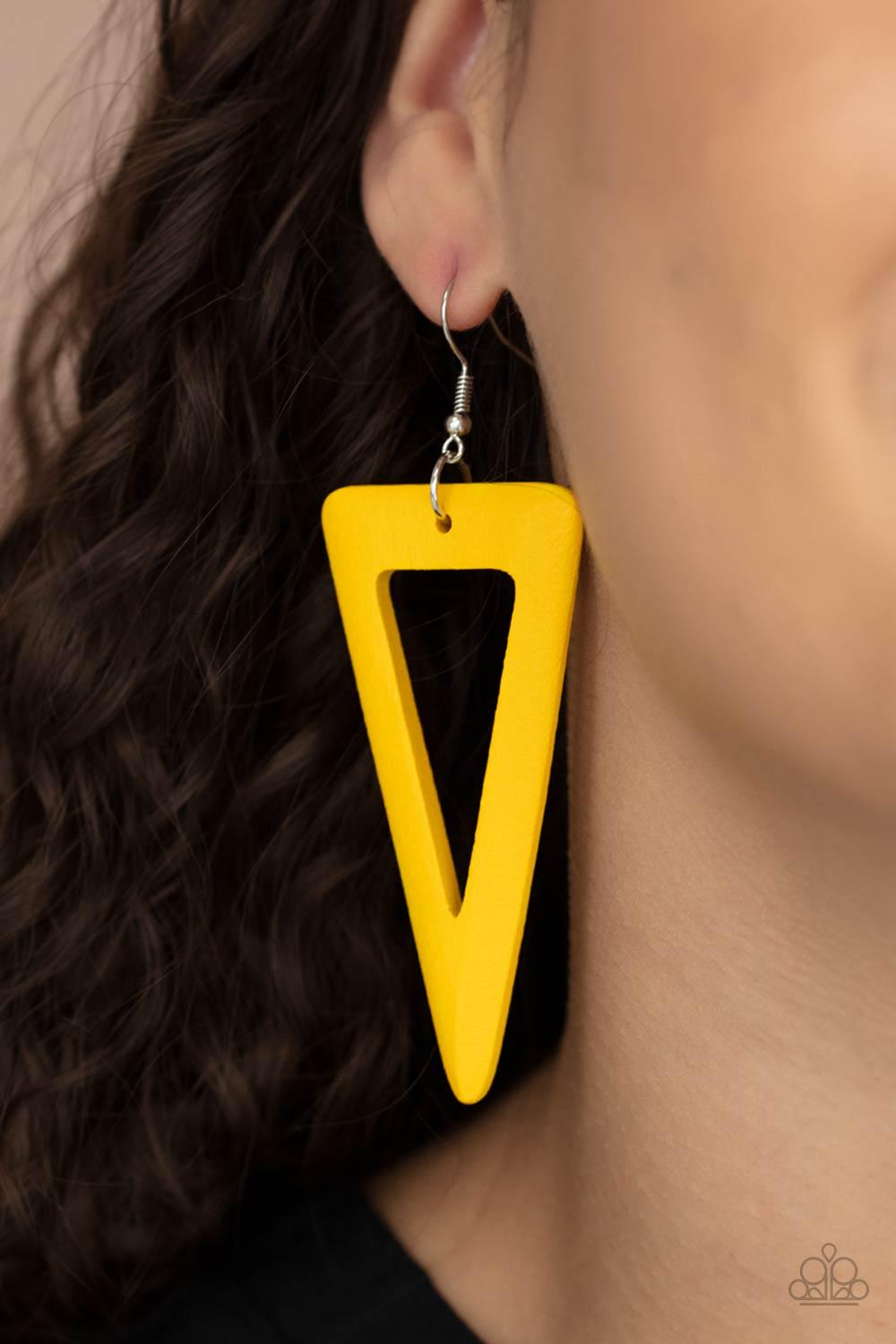 Paparazzi Accessories Bermuda Backpacker - Yellow Painted in a bright yellow finish, a sharp triangular wooden frame swings from the ear for a fiercely earthy look. Earring attaches to a standard fishhook fitting. Sold as one pair of earrings. Earrings