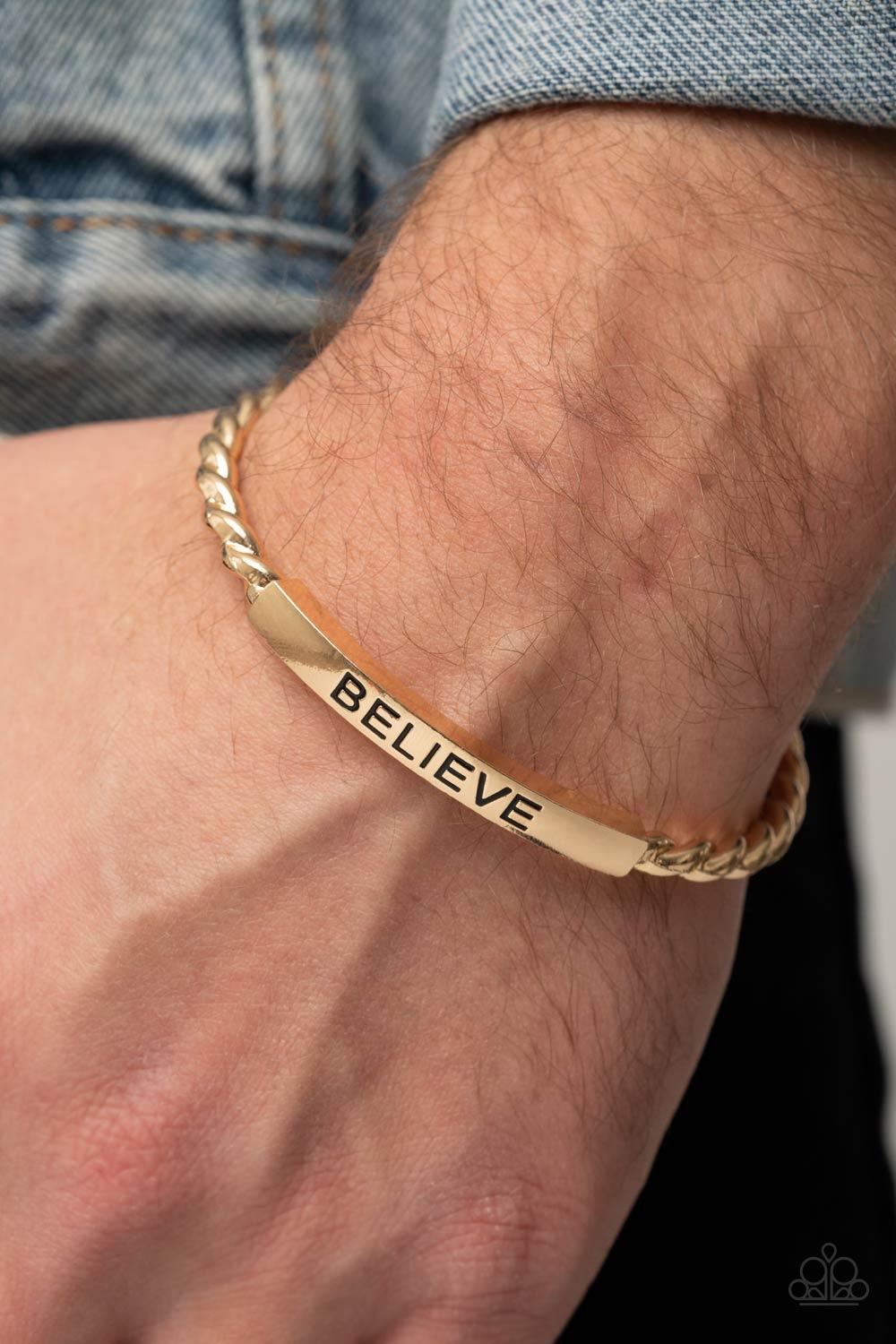Paparazzi Accessories Keep Calm and Believe - Gold Twisted gold bars attach to a shiny gold plate stamped in the word, "BELIEVE," creating an inspiring cuff around the wrist. Sold as one individual necklace. Jewelry