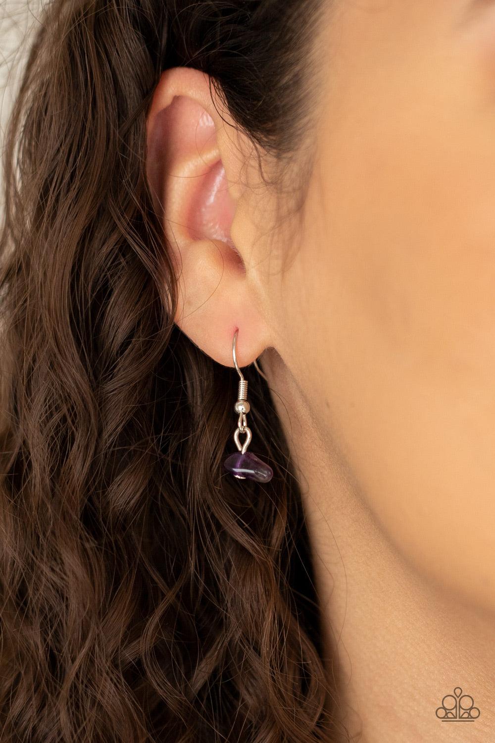 Paparazzi Accessories With Your ART and Soul - Purple Dainty silver rods swing from the bottom of a bowing silver fitting that attaches to sections of Amethyst Orchid pebbles at the bottom of a silver chain, creating a whimsically seasonal display. Featur