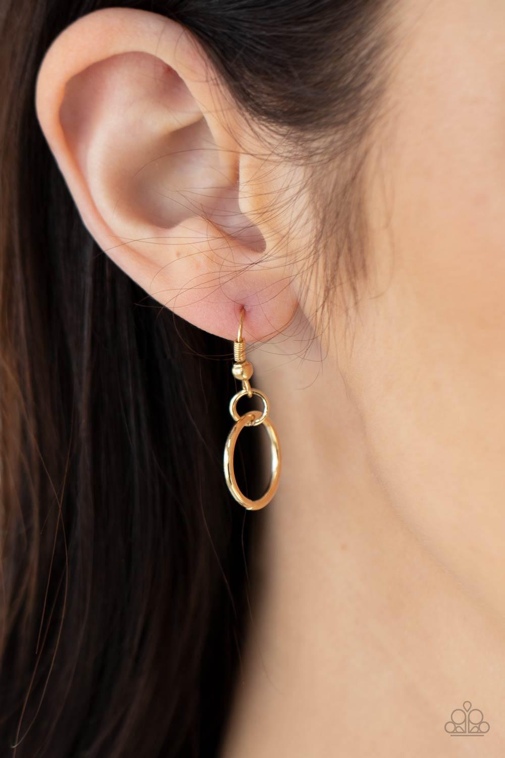 Paparazzi Accessories RING to Reason - Gold A seemingly infinite collection of dainty gold rings are knotted in place along three black cords, creating edgy layers across the chest. Features an adjustable clasp closure. Sold as one individual necklace. In