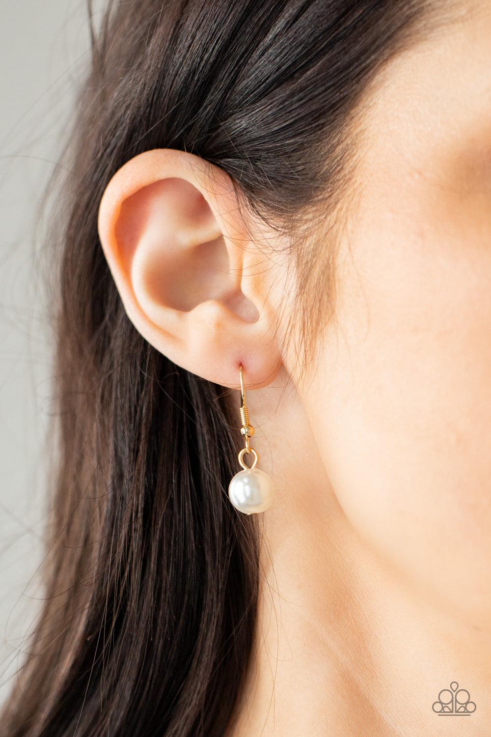 Paparazzi Accessories Royal Reminiscence - Gold Capped in gold fittings, strands of bubbly white pearls and dainty gold popcorn chains delicately weave below the collar, creating an elegantly effervescent centerpiece. Features an adjustable clasp closure.