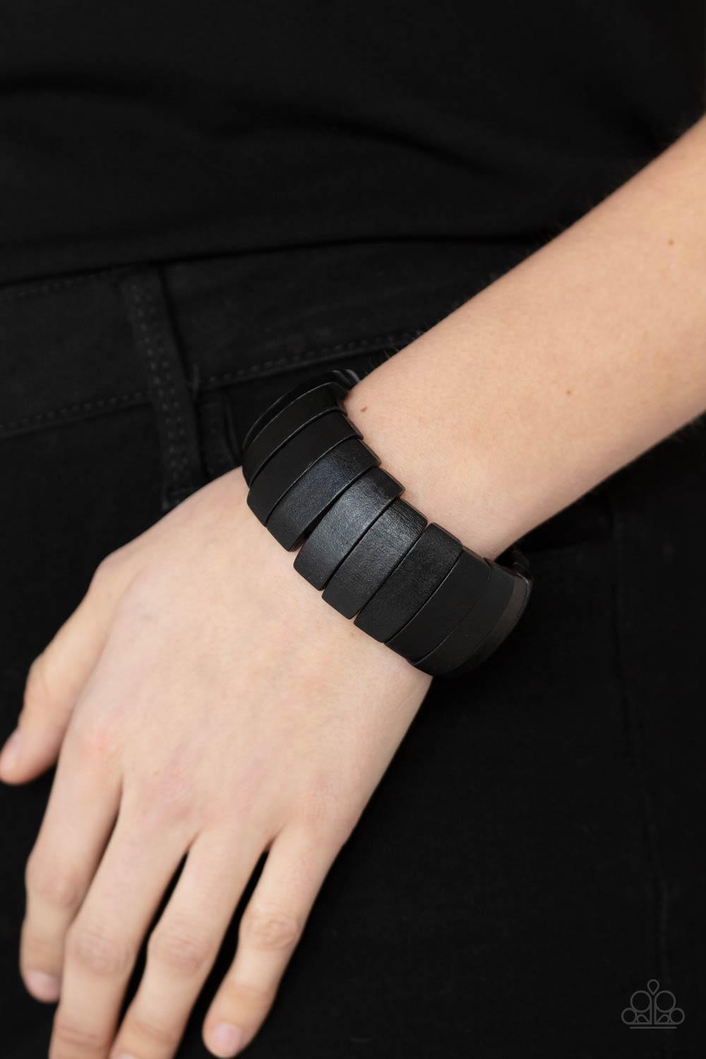 Paparazzi Accessories Raise The BARBADOS - Black A bold collection of black wooden beads are threaded along stretchy bands around the wrist for a colorful display. Sold as one individual bracelet. Jewelry
