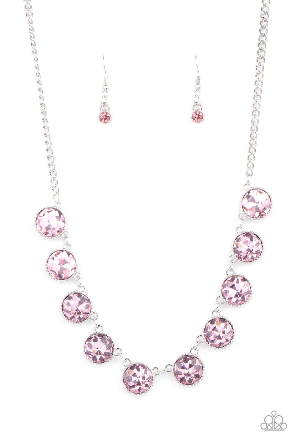 Paparazzi Accessories Mystical Majesty - Pink Featuring a mystical iridescence, a sparkling display of round cut pink gems are encased in delicately textured silver frames as they link below the collar, creating a majestic statement piece. Features an adj
