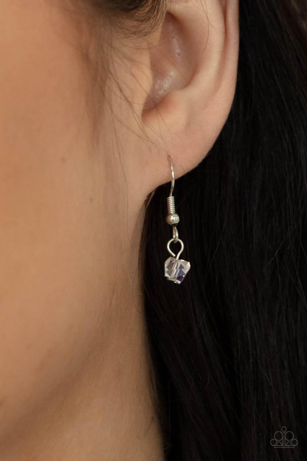 Paparazzi Accessories Olympian Oracle - White Featuring an iridescent shimmer, raw cut glassy beads trickle along a dainty silver chain, giving way to a tranquil crystal-like pendant below the collar. Features an adjustable clasp closure. Sold as one indi