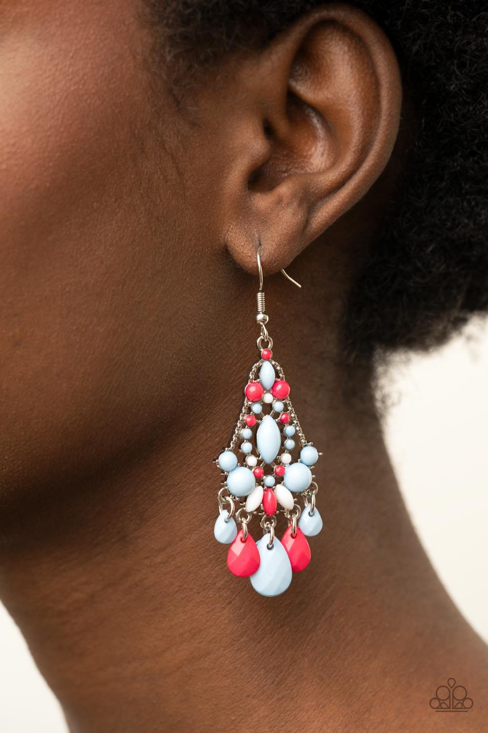 Paparazzi Accessories STAYCATION Home - Multi An array of bubbly Cerulean, white, and Raspberry Sorbet beads decoratively adorn the front of a studded silver frame. Faceted teardrops drip from the bottom of the colorful frame, creating a whimsical fringe.