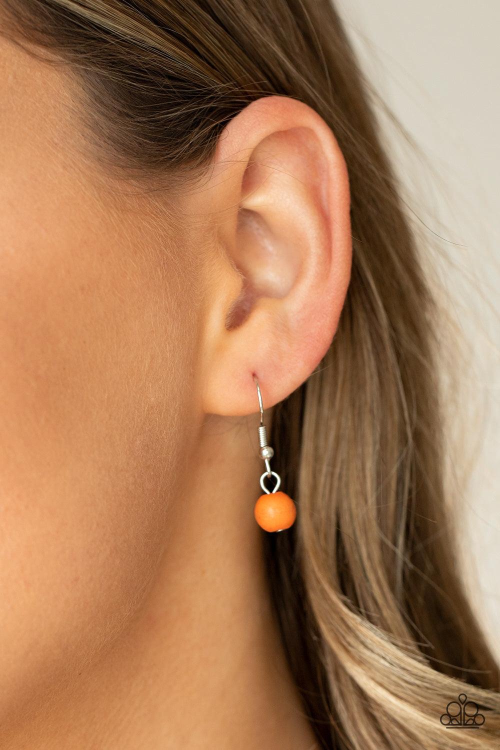 Paparazzi Accessories Stone Prairies - Orange A flared triangular orange stone is pressed into the center of a studded silver frame. A textured ring, dotted with a dainty orange stone, links to the top of the stone creating a dramatically earthy pendant a