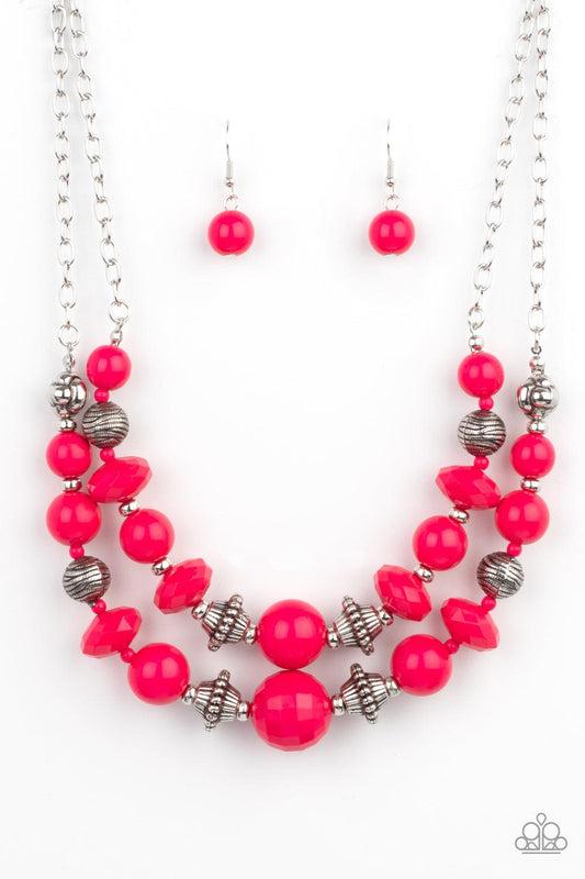 Paparazzi Accessories Upscale Chic - Pink Bold yet whimsical, bright Raspberry Sorbet beads alternate with silver beads etched in a linear pattern along two strands for a vibrant statement below the collar. Features an adjustable clasp closure. Sold as on