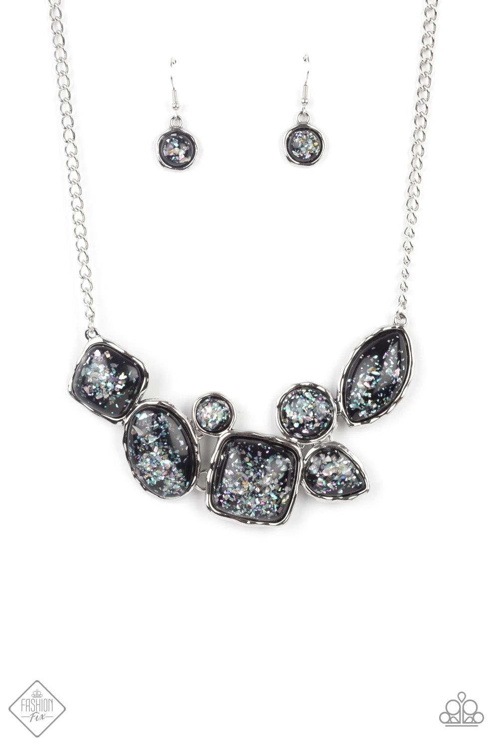 Paparazzi Accessories So Jelly - Black Flecks of iridescent shell-like pieces are encased in glassy black beads. Featuring hammered silver frames, the mismatched frames delicately cluster below the collar for a bubbly ethereal fashion. Features an adjusta