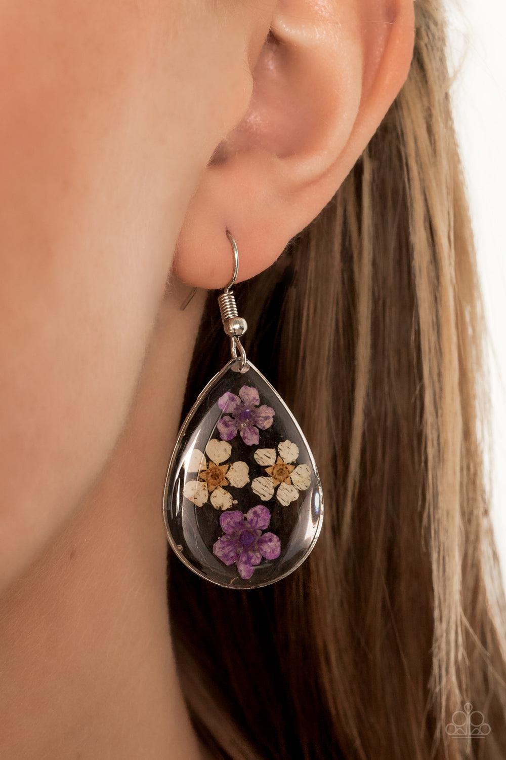 Paparazzi Accessories Perennial Prairie - Multi Dainty yellow and purple flowers are encased in a glassy teardrop, creating a whimsical frame. Earring attaches to a standard fishhook fitting. Sold as one pair of earrings. Jewelry
