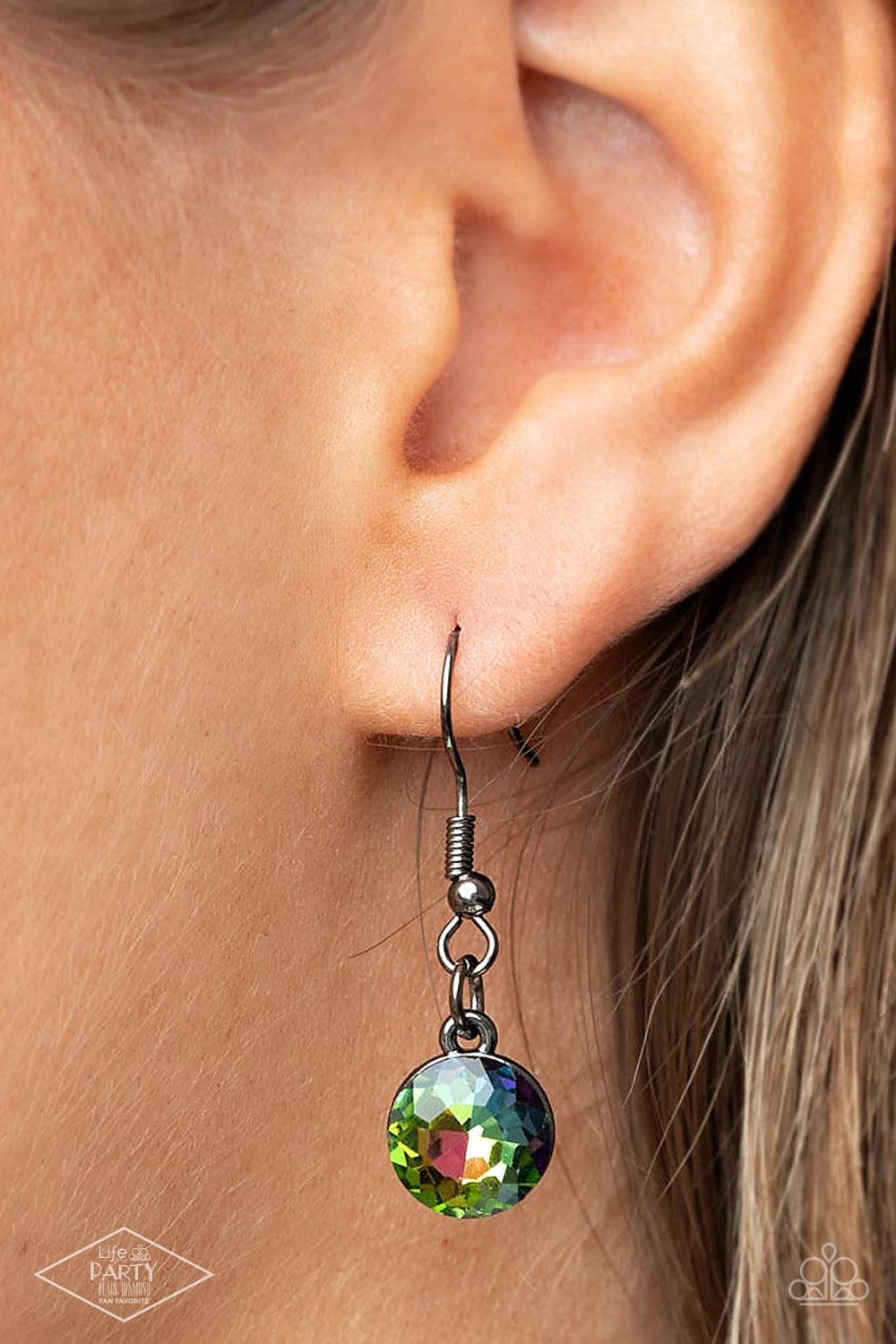 Paparazzi Accessories Unfiltered Confidence - Multi A trio of brilliant oil spill square gut gems encased in classic gunmetal fittings takes center stage. Teardrop and round oil spill gems link to a gunmetal chain on either side of the trio for a striking