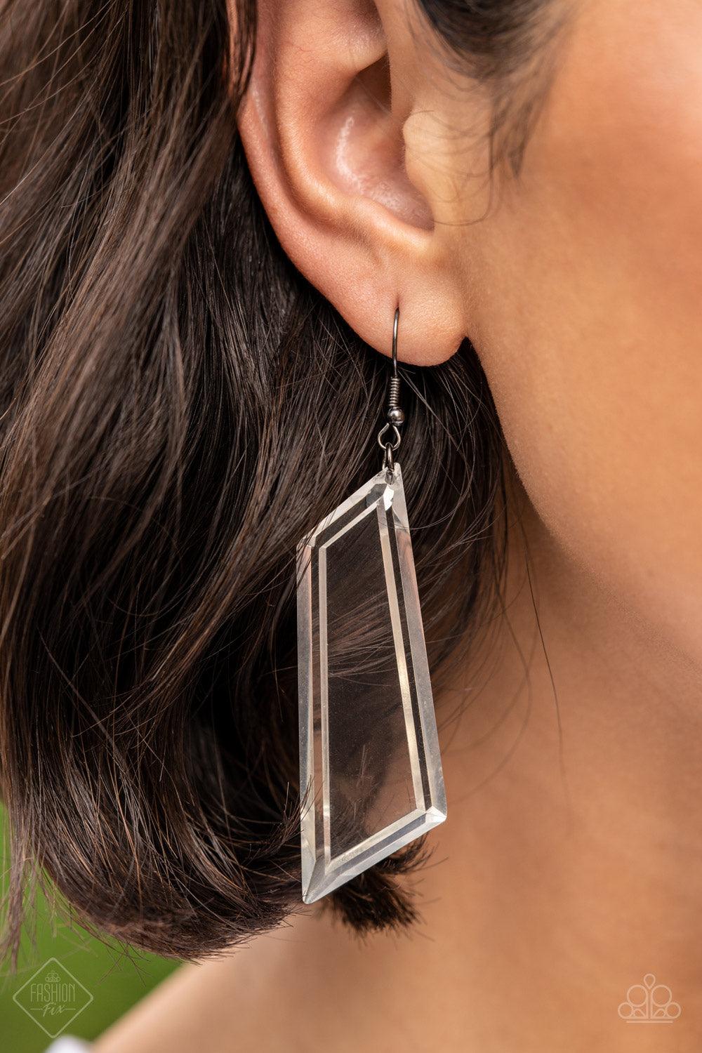 Paparazzi Accessories The Final Cut - Black Featuring a flashy emerald-like cut, an asymmetrical crystal-like acrylic frame swings from the ear, casting rainbow reflections with its glassy exterior. Earring attaches to a standard fishhook fitting. Sold as