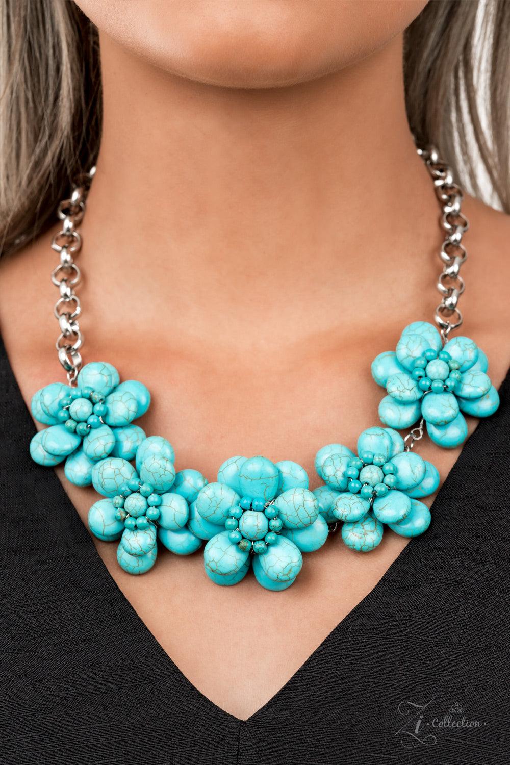 Paparazzi Accessories Genuine Dainty silver wire delicately wraps around earthy turquoise stone teardrop petals that beautifully layer into bountiful blossoms. Featuring turquoise stone beaded centers, the harmonious stone flowers gracefully connect to a