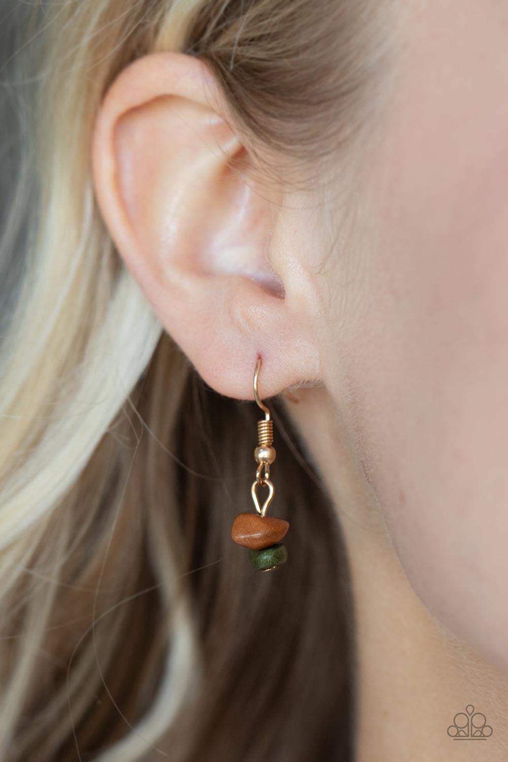 Paparazzi Accessories Artisanal Abundance - Multi Infused with sections of earthy brown, black, and green stones, a trio of mismatched gold chains layer down the chest for a dash of rustic refinement. Features an adjustable clasp closure. Sold as one indi