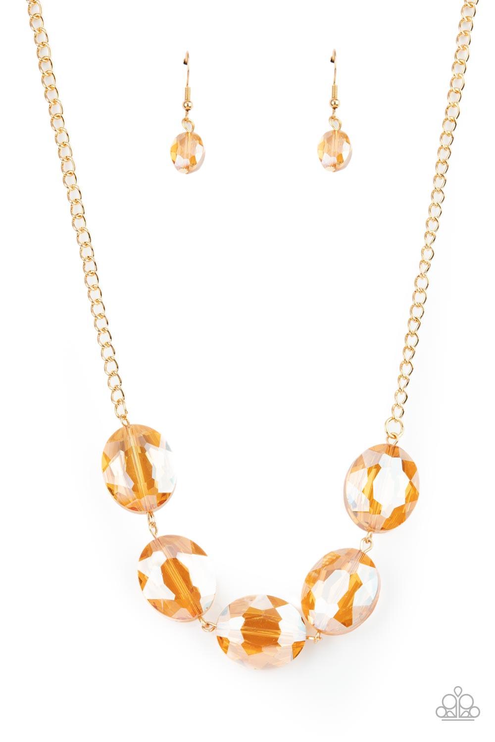 Paparazzi Accessories Cosmic Closeup - Gold Brushed in an iridescent finish, a faceted collection of oversized golden gems delicately links below the collar for a gritty glamorous look. Features an adjustable clasp closure. Sold as one individual necklace
