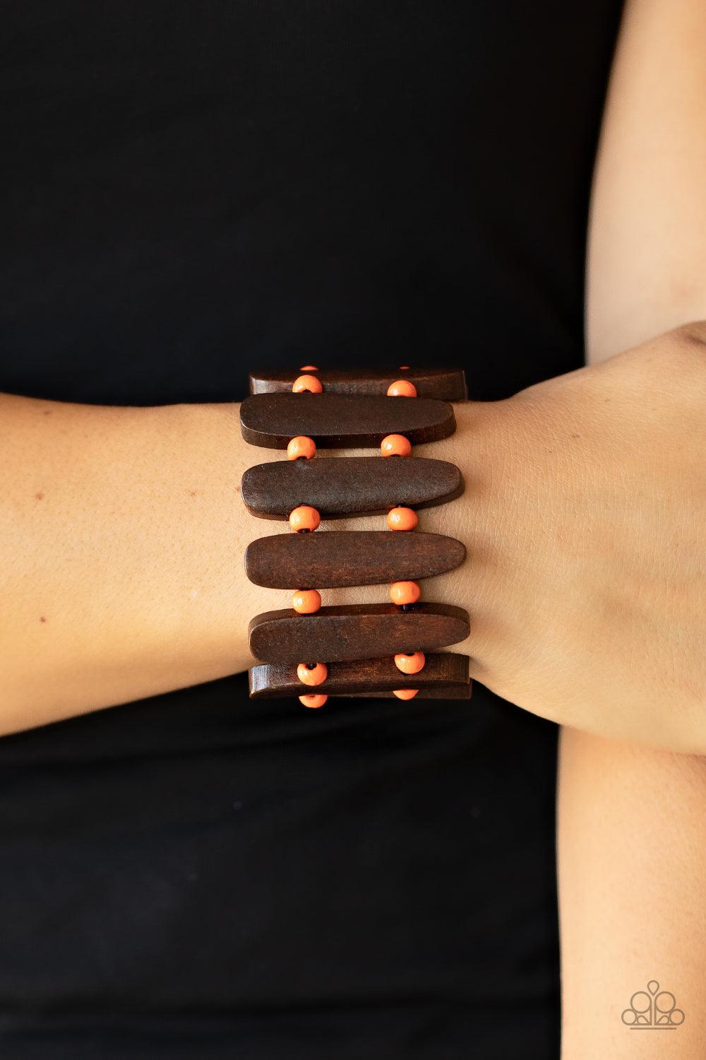 Paparazzi Accessories Coronado Cabana - Orange Pairs of Burnt Orange wooden beads and oblong brown wooden frames alternate along stretchy bands around the wrist for a seasonal pop of color. Sold as one individual bracelet. Jewelry