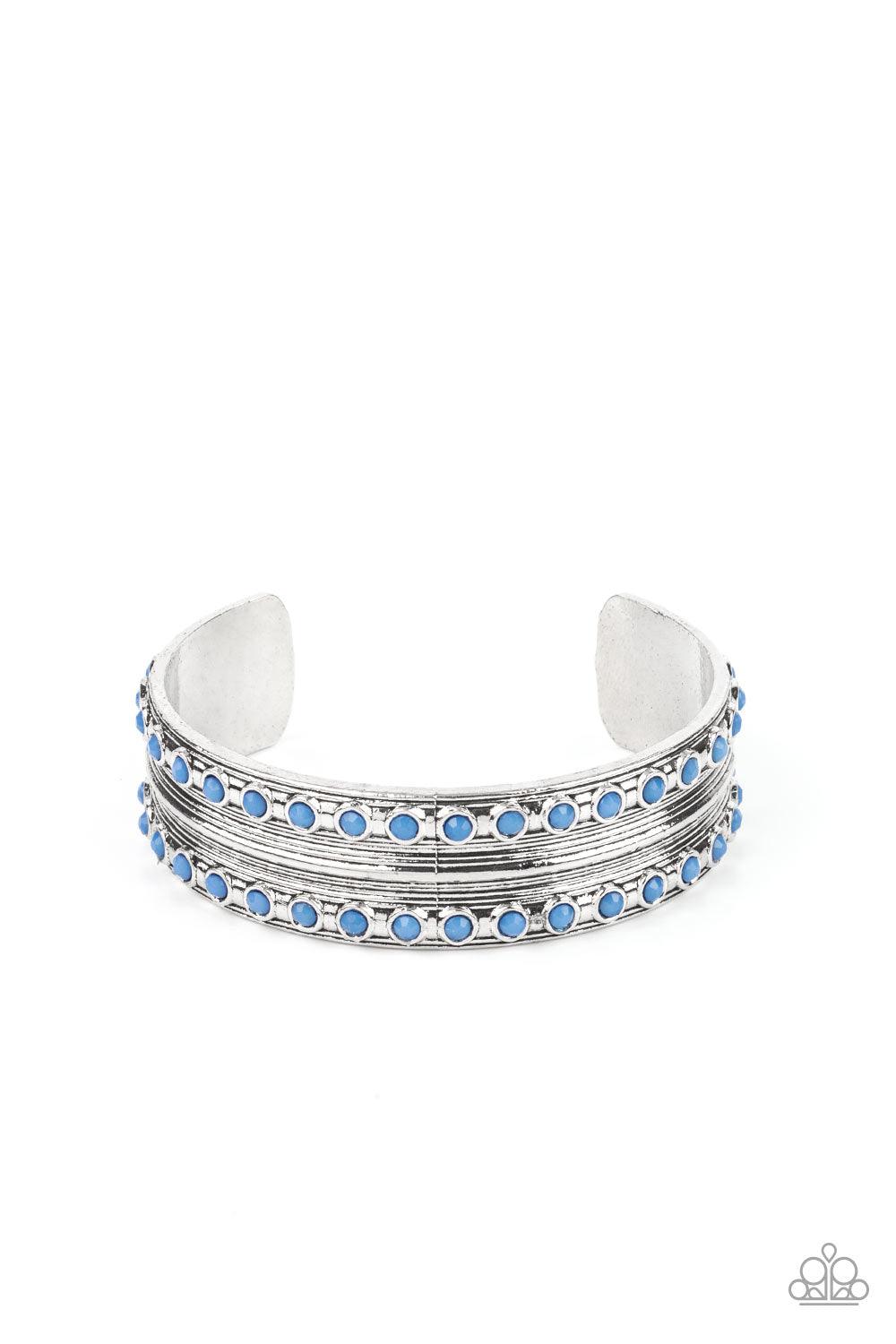 Paparazzi Accessories Costa Rica Retreat - Blue Etched and embossed in stacks of linear texture, an antiqued silver cuff is bordered in rows of faceted Spring Lake beads for a refreshing finish. Sold as one individual bracelet. Bracelets