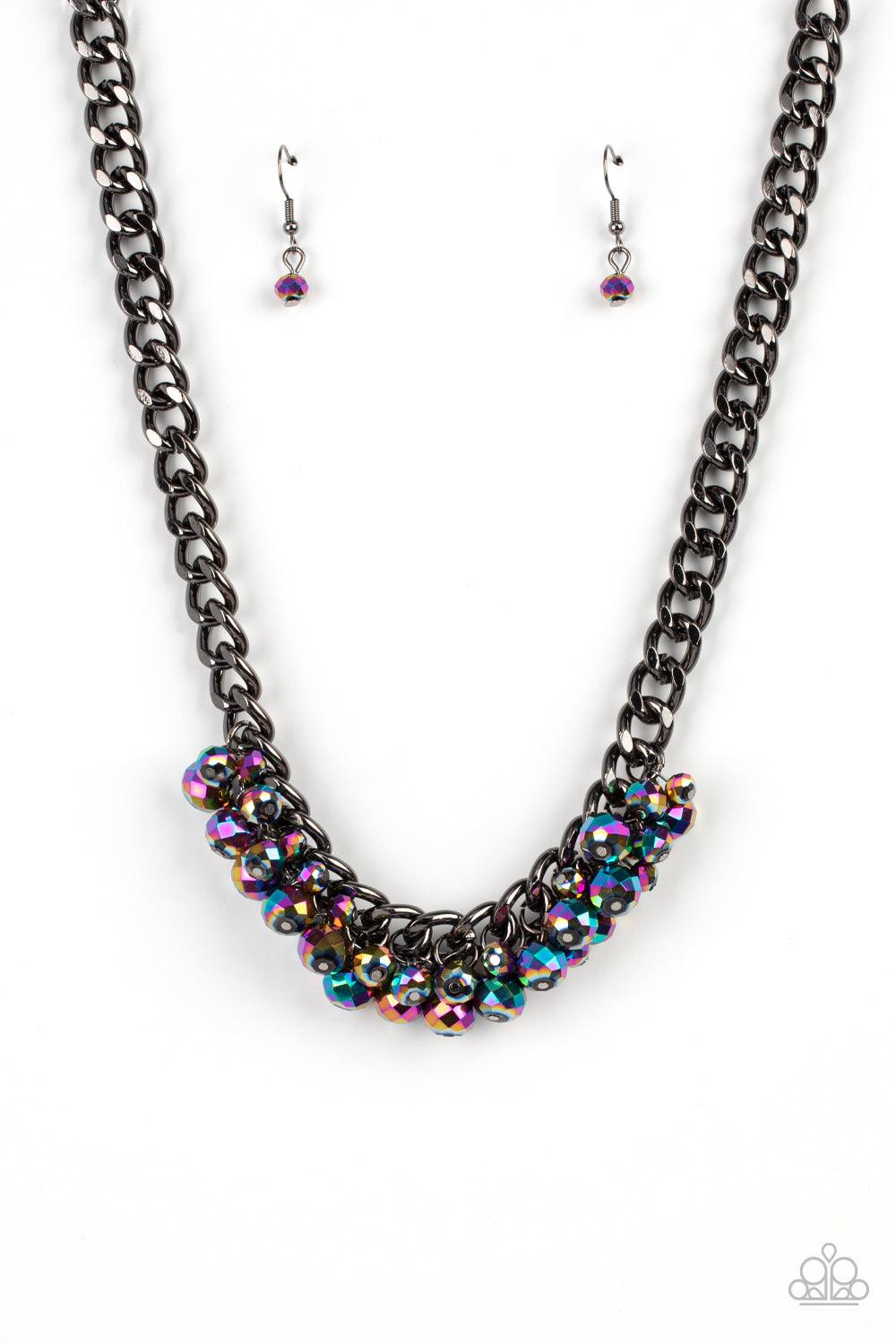 Paparazzi Accessories Galactic Knockout - Multi Flecked in oil spill iridescence, a faceted collection of metallic beads cluster along the center of a chunky gunmetal curb chain, creating a stellar fringe below the collar. Features an adjustable clasp clo