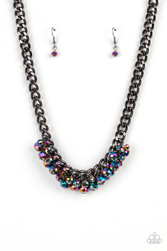 Paparazzi Accessories Galactic Knockout - Multi Flecked in oil spill iridescence, a faceted collection of metallic beads cluster along the center of a chunky gunmetal curb chain, creating a stellar fringe below the collar. Features an adjustable clasp clo