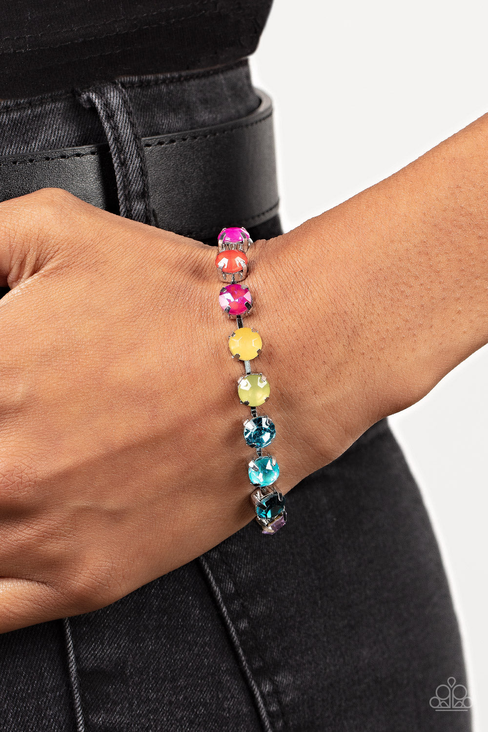 Paparazzi Accessories Dreamy Debutante - Multi Encased in classic silver pronged fittings, an oversized display of dewy, iridescent, and classic multicolored rhinestones delicately links around the wrist for a dreamy dazzle. Features an adjustable clasp c