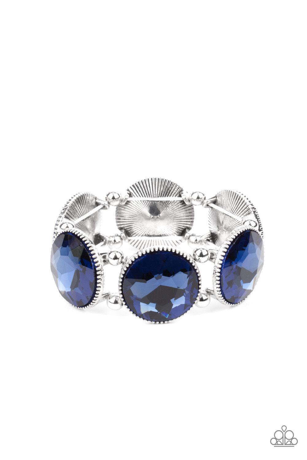 Paparazzi Accessories Powerhouse Hustle - Blue Infused with pairs of silver beads, a glitzy collection of dramatically oversized Rhodonite rhinestone frames are threaded along stretchy bands around the wrist for a jaw-dropping dazzle. Sold as one individu