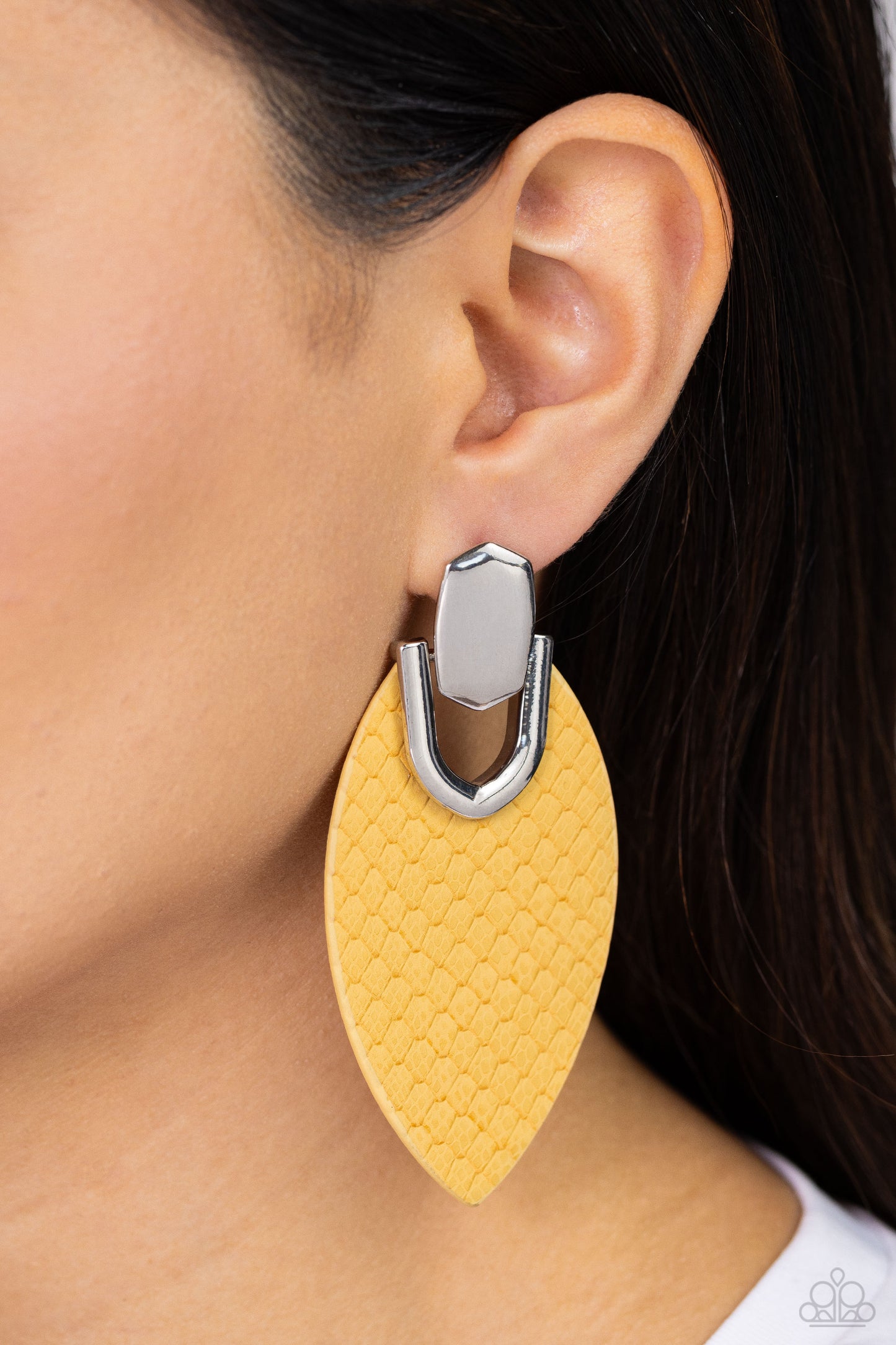 Paparazzi Accessories Wildly Workable - Yellow Featuring python-like texture, an oval yellow leather frame attaches to a bold silver fitting, creating a wild lure. Earring attaches to a standard post fitting. Sold as one pair of post earrings. Jewelry